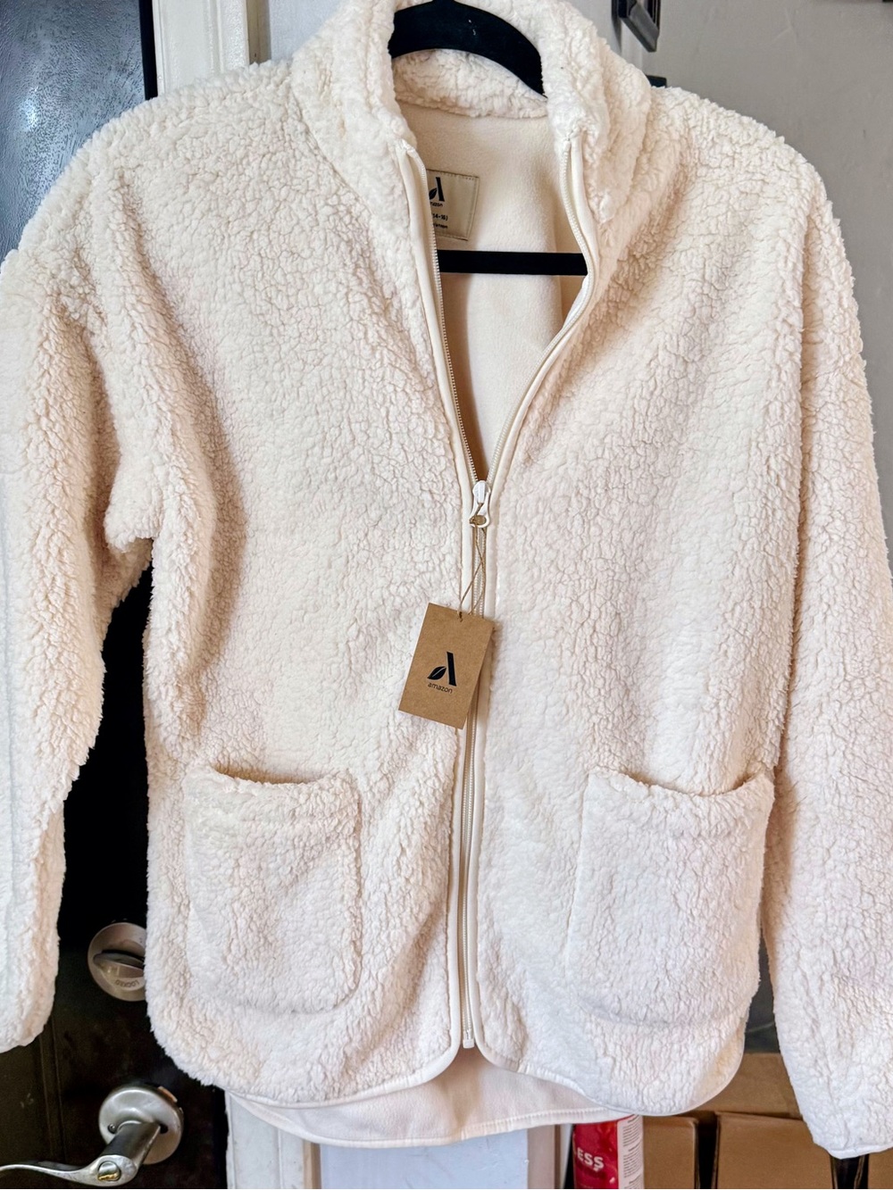 Amazon Cream Sherpa Zip-Up Jacket for Kids, can fit youth small.